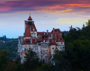 Medieval Bran Castle commonly known as Dracula Castle at sunset, Romania