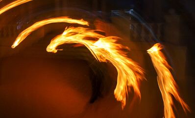 Flame of fire in motion at night.