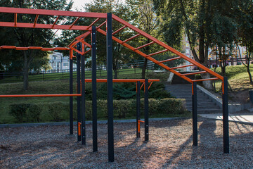 Fototapeta na wymiar sports ground with exercise equipment in the park