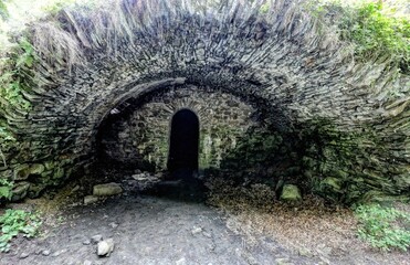 Old castle cellar or vault entrance with arched ceiling