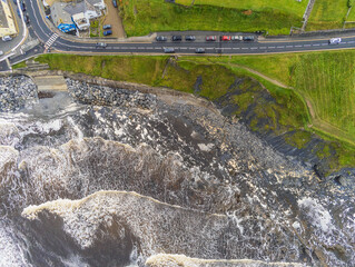 Aerial drone view on Atlantic ocean, Lahinch area, county Clare, Ireland. Powerful ocean waves...
