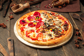 Four seasons pizza with different toppings