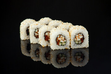 sushi on a black background