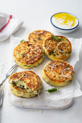 Cottage cheese pancakes with spinach and cheese.