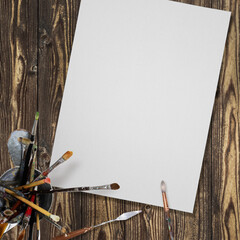 Canvas and brush placed on the desk