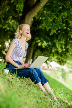 Why employees need to work outdoors. Girl laptop outdoors. Being outdoors exposes workers to fresher air and environmental variations making happy and healthy on physical and emotional level