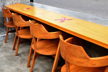 Fototapeta na wymiar tables and chairs made of wood which is suitable for coffee shop