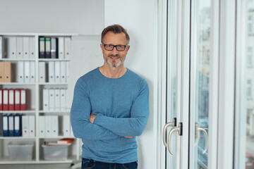 Handsome middle-aged man in blue sweater