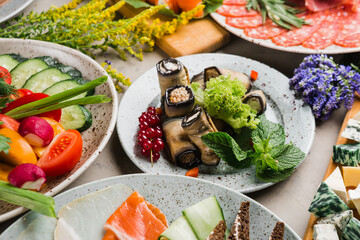 many beautiful dishes and salads for the buffet