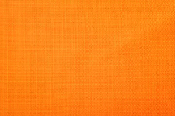 Orange linen fabric of table cloth texture background