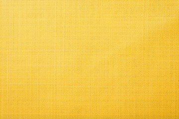 Golden yellow linen fabric of table cloth texture background