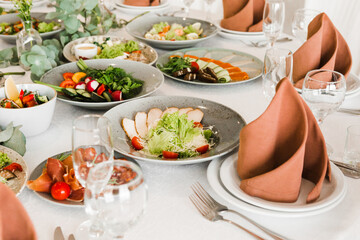 table setting with cutlery and dishes in the restaurant