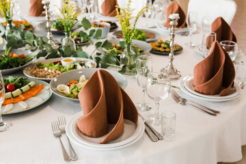 table setting with cutlery and dishes in the restaurant