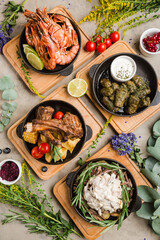 assortment of grilled meat and fish