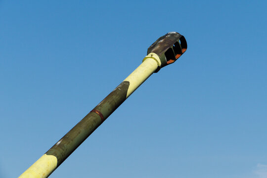Cannon barrel against clear blue sky
