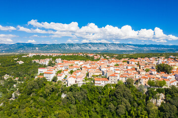 Fototapeta na wymiar Panoramic view of the old town of Omisalj on high cliff, Krk island, Kvarner, Croatia