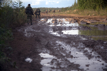 A group of soldiers. A group of soldiers on a field position.
