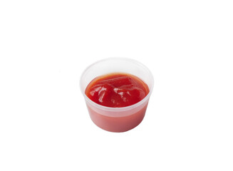 tomato sauce in a plastic container on an isolated white background