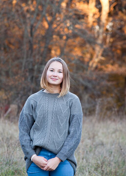 Girl in autumn forest