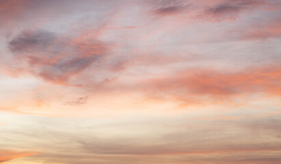 Sunset background sky with soft and blur pastel colour in pink and orange tone