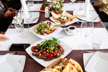 set table before start of anniversary celebration inside restaurant