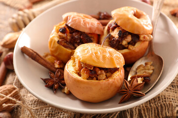 baked apple with fruits and spices