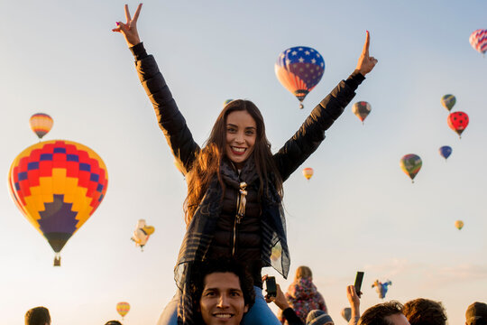 Happy party couple at balloon festival