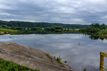 Midsummer. View of a reservoir on the Protva River in Russia. A great place for boating and fishing.