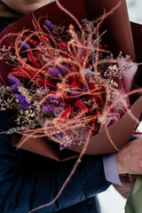Close-up bouquet of dried flowers in package