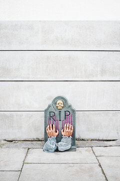 Fake tombstone on a pavement