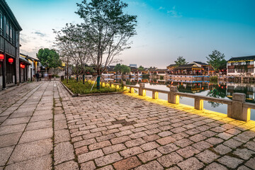 Fototapeta premium Ancient buildings by the river in Dangkou Ancient Town, Wuxi, Jiangsu, China
