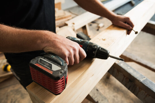 Close up of carpenter's cordless screwdriver