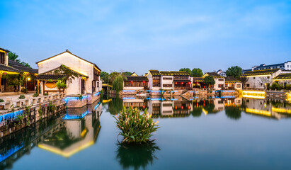 Fototapeta na wymiar Ancient buildings by the river in Dangkou Ancient Town, Wuxi, Jiangsu, China