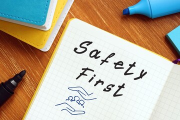 Business concept about Safety First with inscription on the page.
