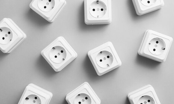 Blanc eletric plug on white/gray background.