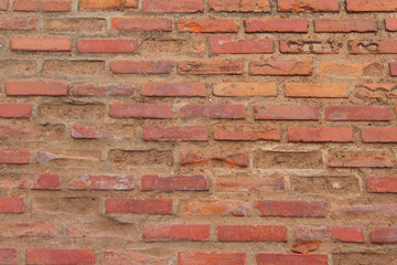 Obraz premium Red brick wall, wide angle of masonry Copy space Text area Design background