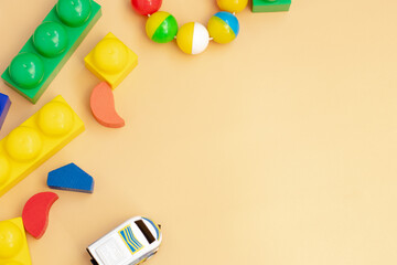 children's toys on a yellow background. the view from the top