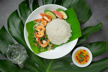 Thai food; Shrimp and squid fried cooked with long beans and rice.
