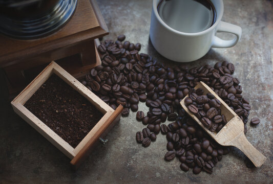 Coffee,beans and a grinder.