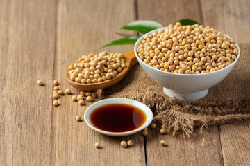Soybean Sauce and Soybean on Wooden Floor Soy sauce Food nutrition concept.