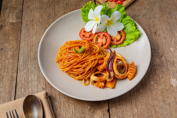 Spaghetti Seafood with Tomato Sauce Decorated with beautiful ingredients.