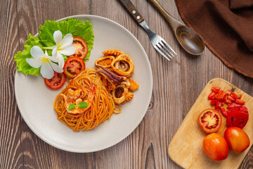 Spaghetti Seafood with Tomato Sauce Decorated with beautiful ingredients.
