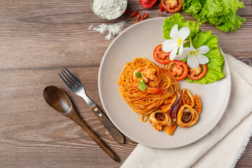 Spaghetti Seafood with Tomato Sauce Decorated with beautiful ingredients.