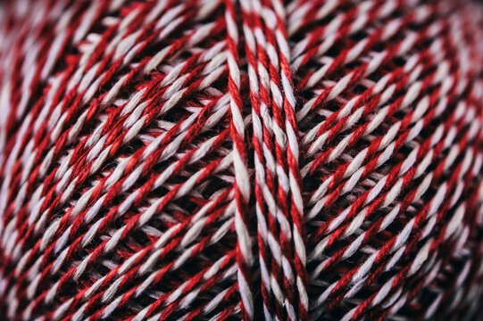 Detail of a Red and White Striped Thread