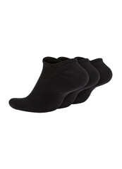 Three black socks isolated on white background. Three pair of socks. Set of short socks for sports on invisible foot as mock up for advertising, branding, design.