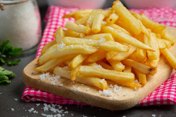 Crispy French fries with ketchup and mayonnaise.