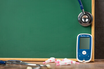 World diabetes day;Medical equipment in front of blackboard