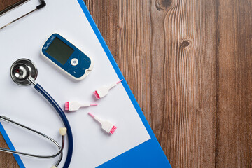 World diabetes day;Medical equipment on wooden floor