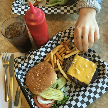 Delicious cheeseburgers and fries at the diner