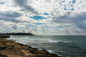 Empty Mediterranean beach before the rain near old Yaffa in Tel Aviv, Israel.